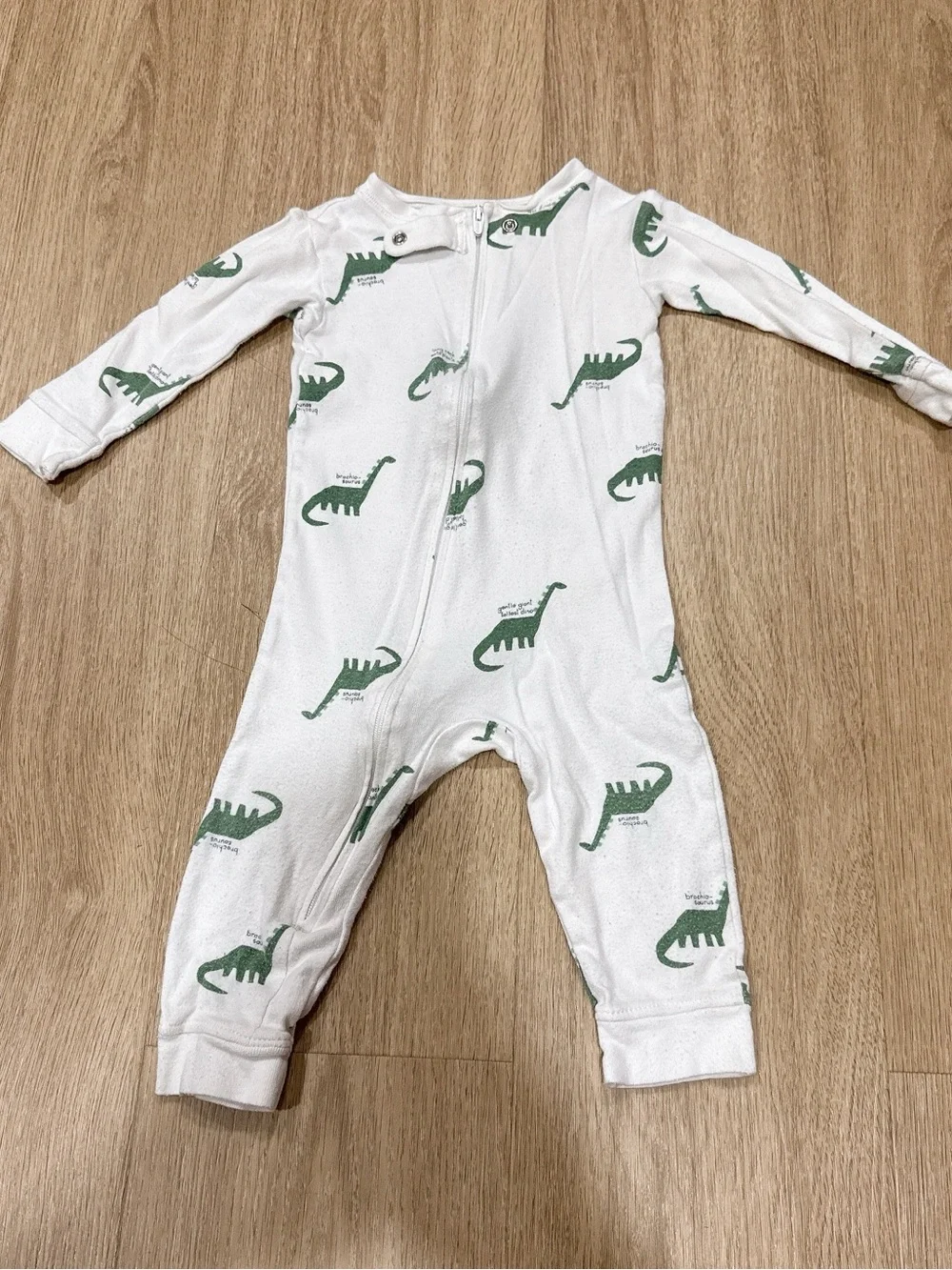 Carter's White Footie with Green Dinosaur Print